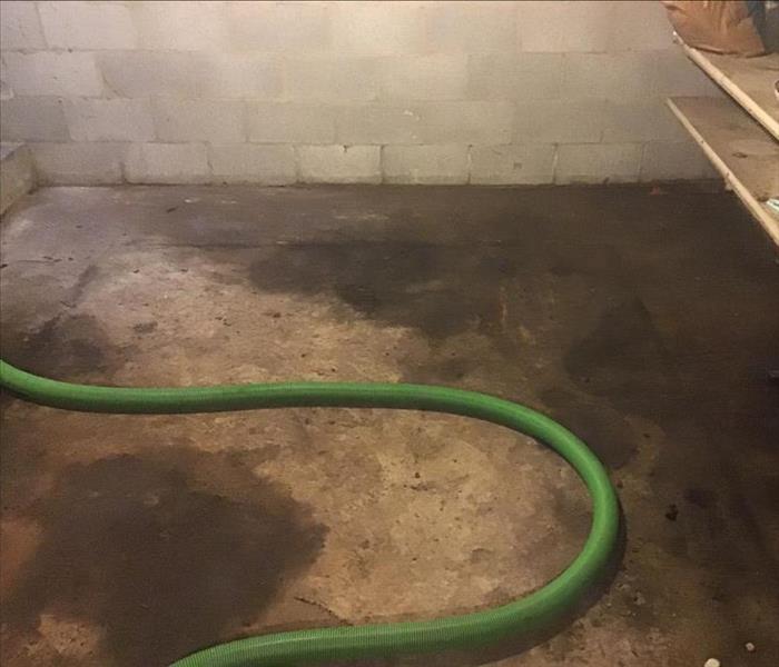 Concrete basement floor after steaming and disinfecting