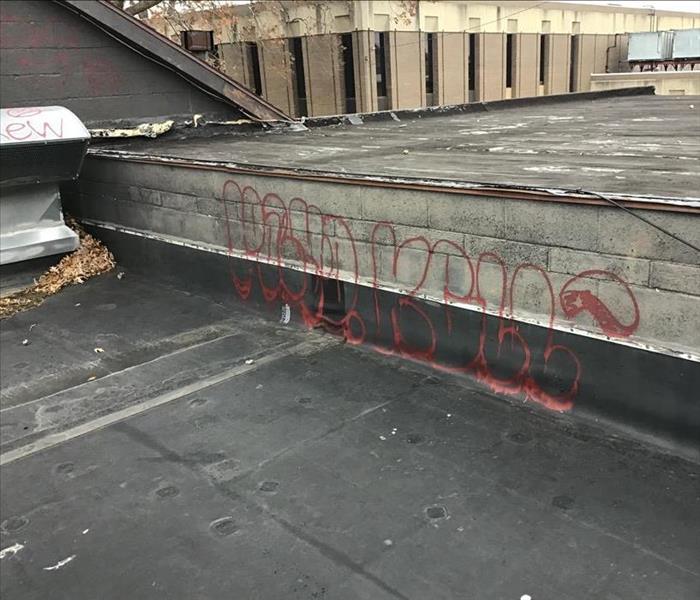 Graffiti on school rooftop before SERVPRO