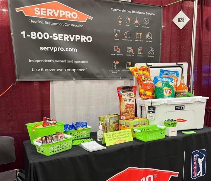 Table display with giveaways at conference