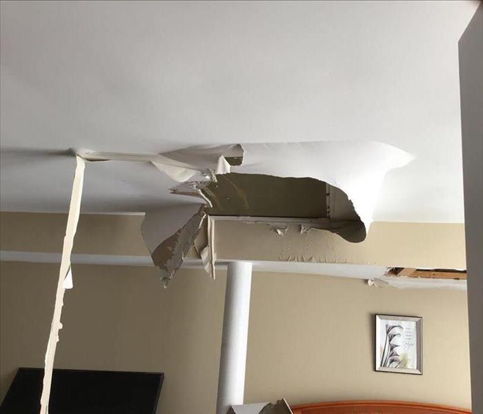Ceiling caving in from water damage