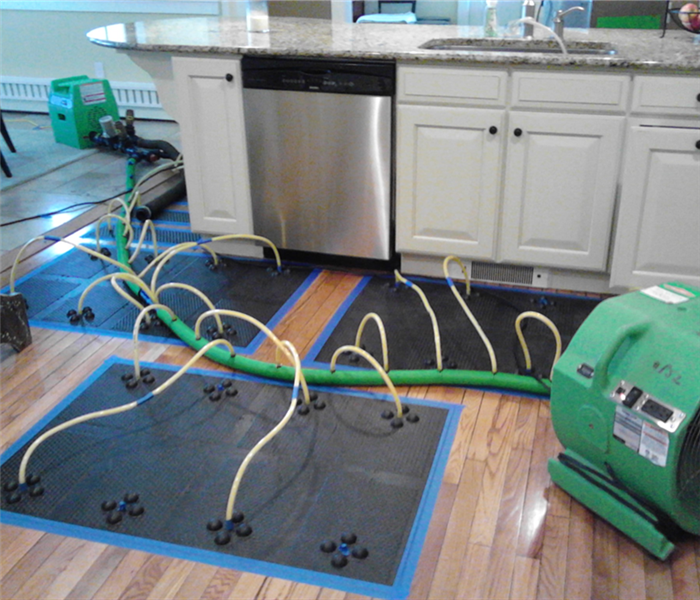 Drying mat system set up in household kitchen